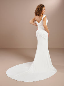 Figure Hugging Fit And Flare Draped Surplice Wedding Gown In Ivory